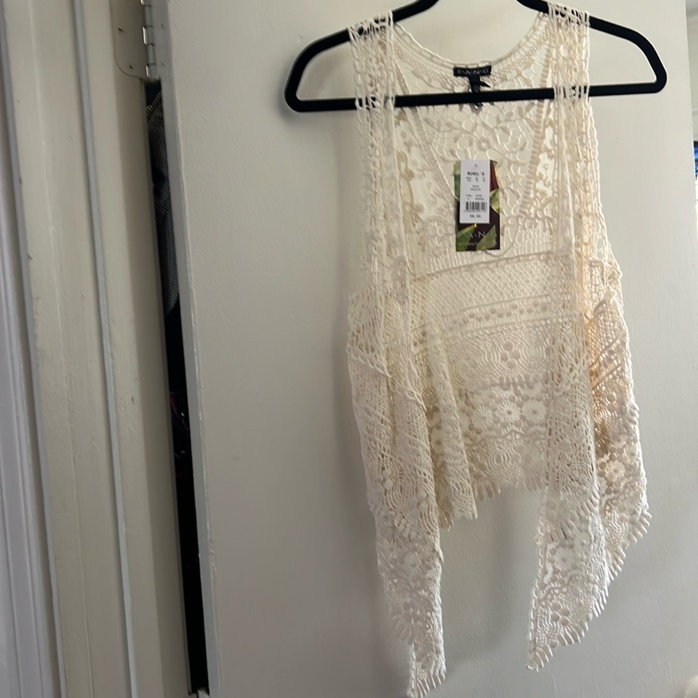 Brand new with tags on!  Vest you can dress up or down!